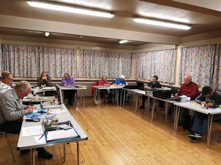 The group at work on a Wednesday meeting